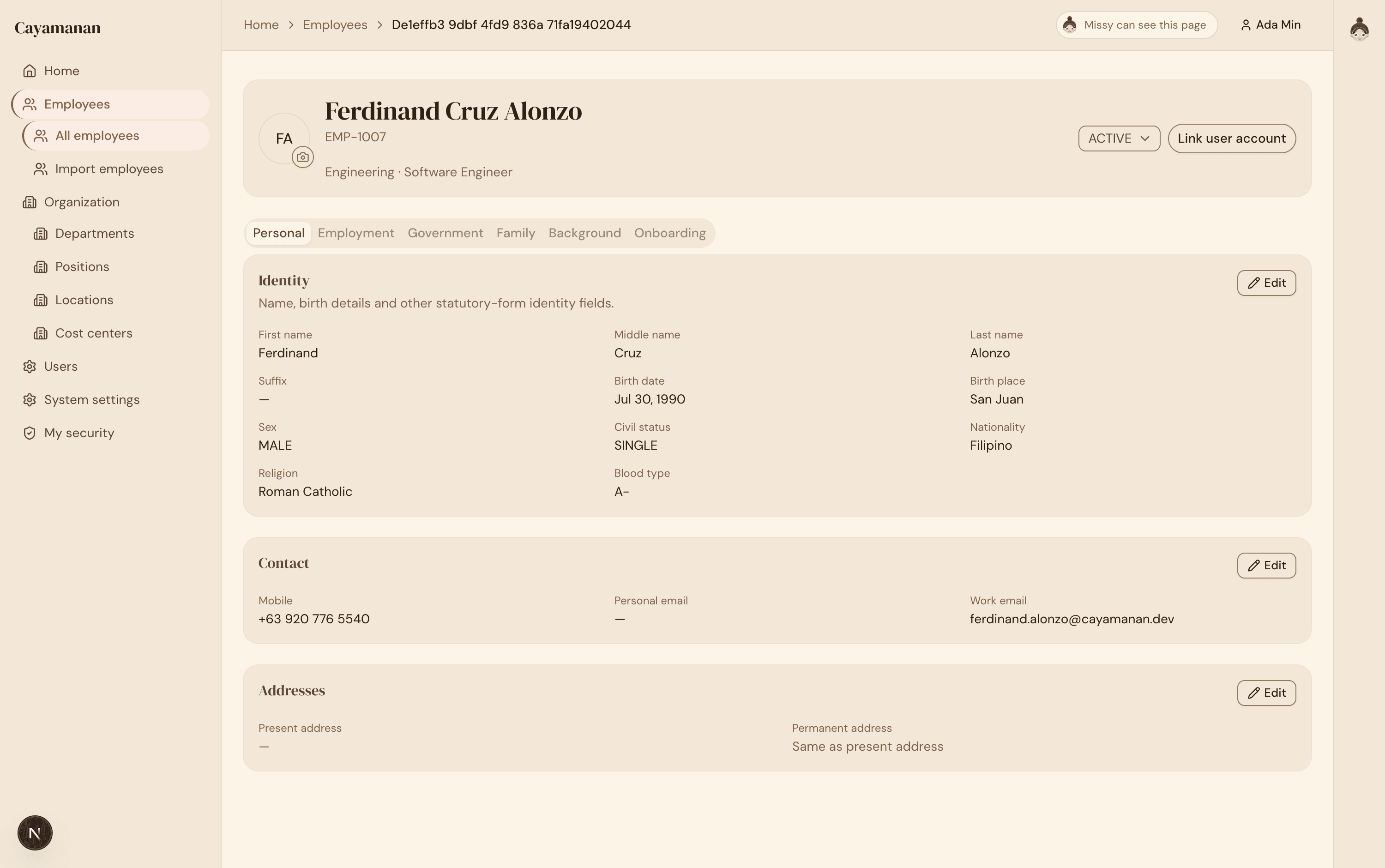An employee record open in Cayamanan, showing identity, contact and address details across tabbed sections